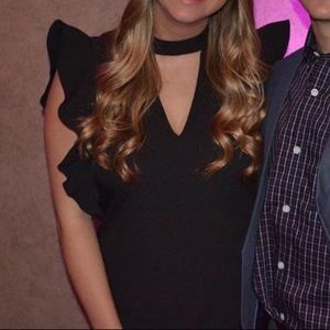 Black sleeveless ruffle dress